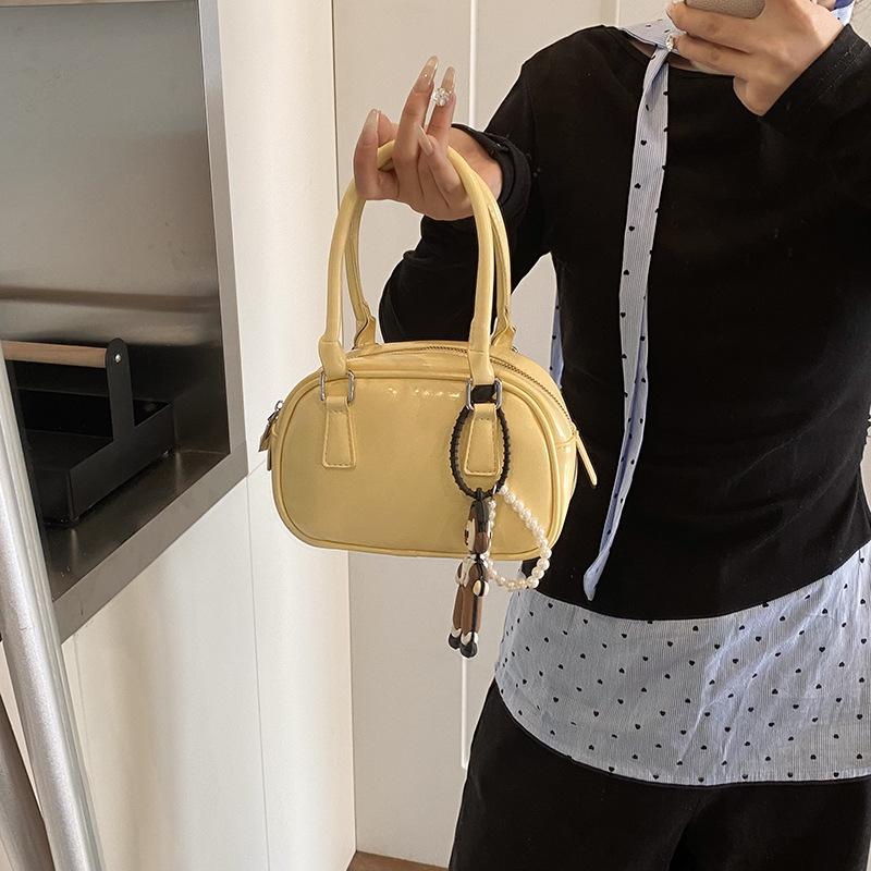 Премиальная нишевая сумка с чувством, женская 2025, новая весенне-летняя модная повседневная сумка через плечо, сумка-мессенджер, портативная сумка-боулинг