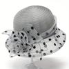 Elevate Your Vacation Look with This Stylish Flower Decor Dotted Print Bucket Hat