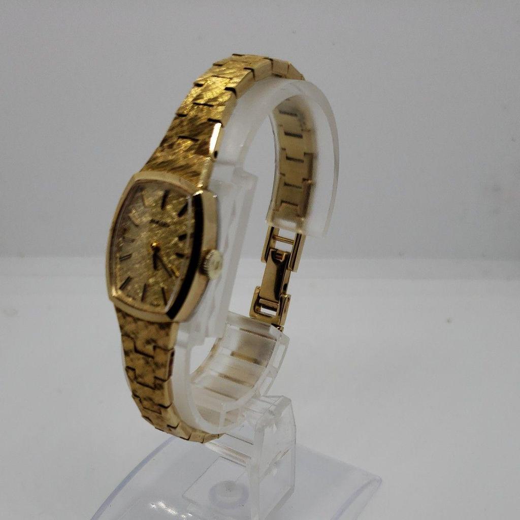Б/у женские часы RADO золотого цвета