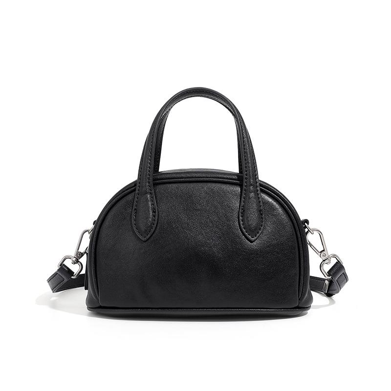 Женская сумка-боулинг Boston Bowling Bag из натуральной кожи растительного дубления Niche с одним плечом и через плечо