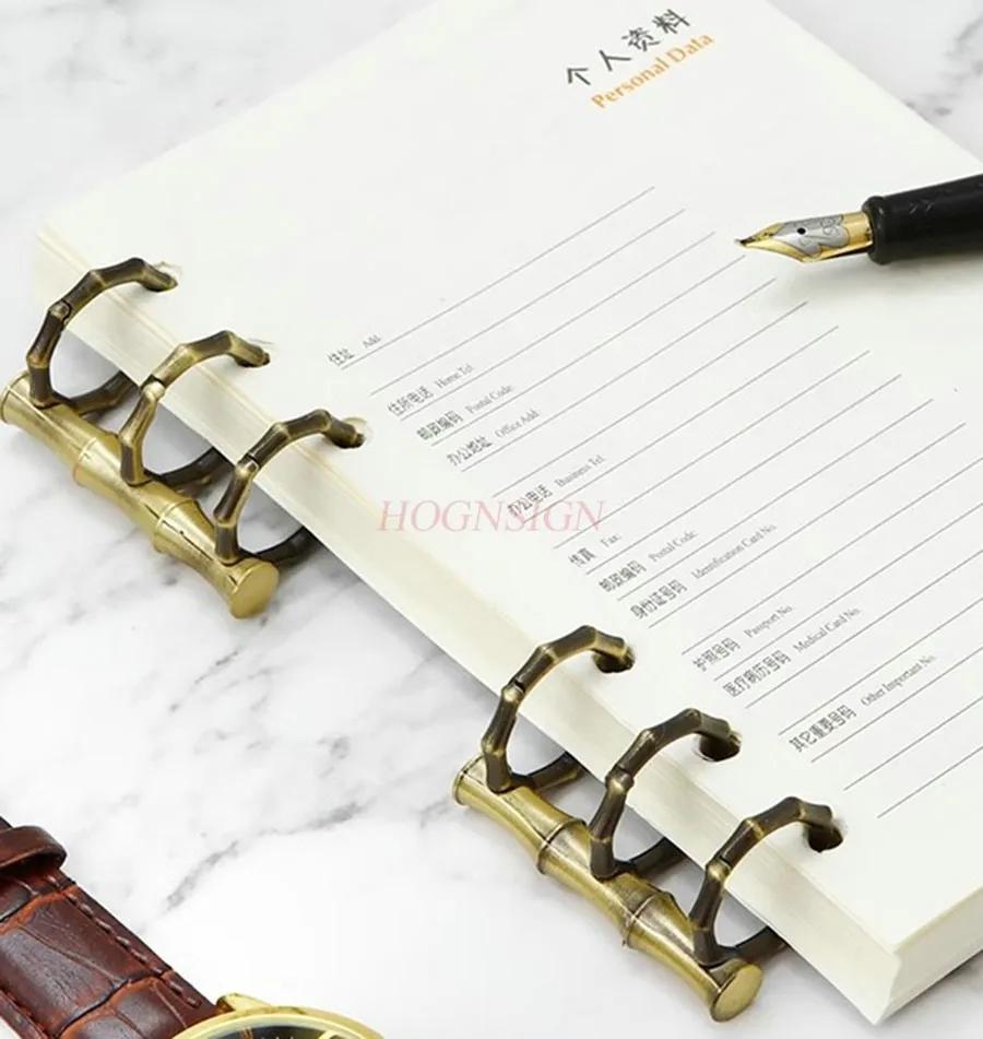 Metal three ring binder, notebook, ledger, inner pages, binding ring, desk calendar, photo album, binding clip