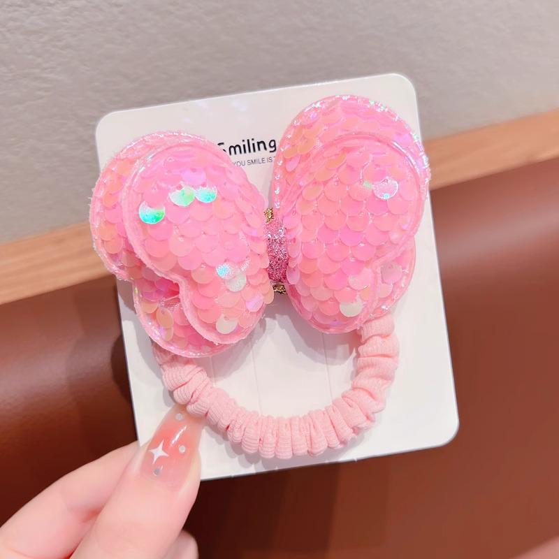 Детская резинка для волос с пайетками в виде бабочки не повредит волосы. Идеально подходит для высоких хвостов или в качестве головного убора для девочек.