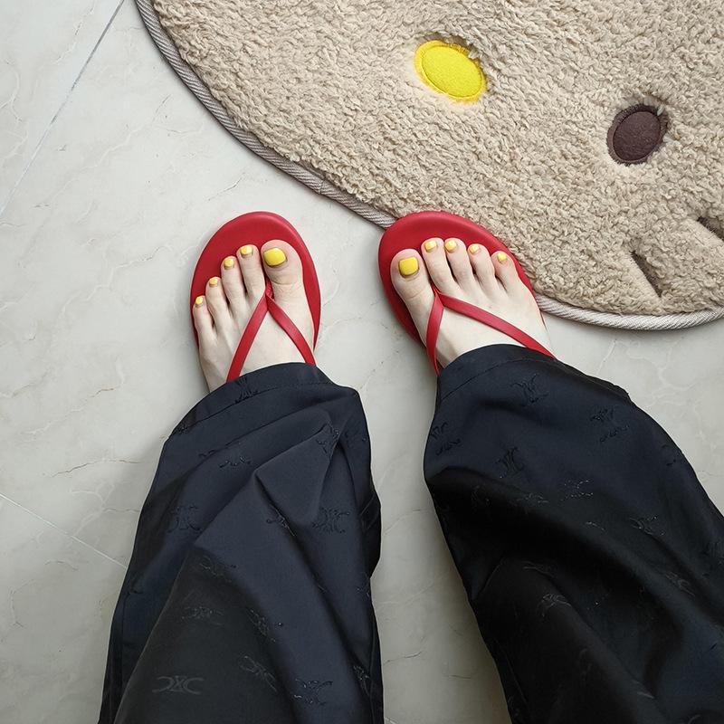 Whole cowhide~ niche flip-flops red summer wear seaside beach ladies flat-bottomed slippers pinch women's black