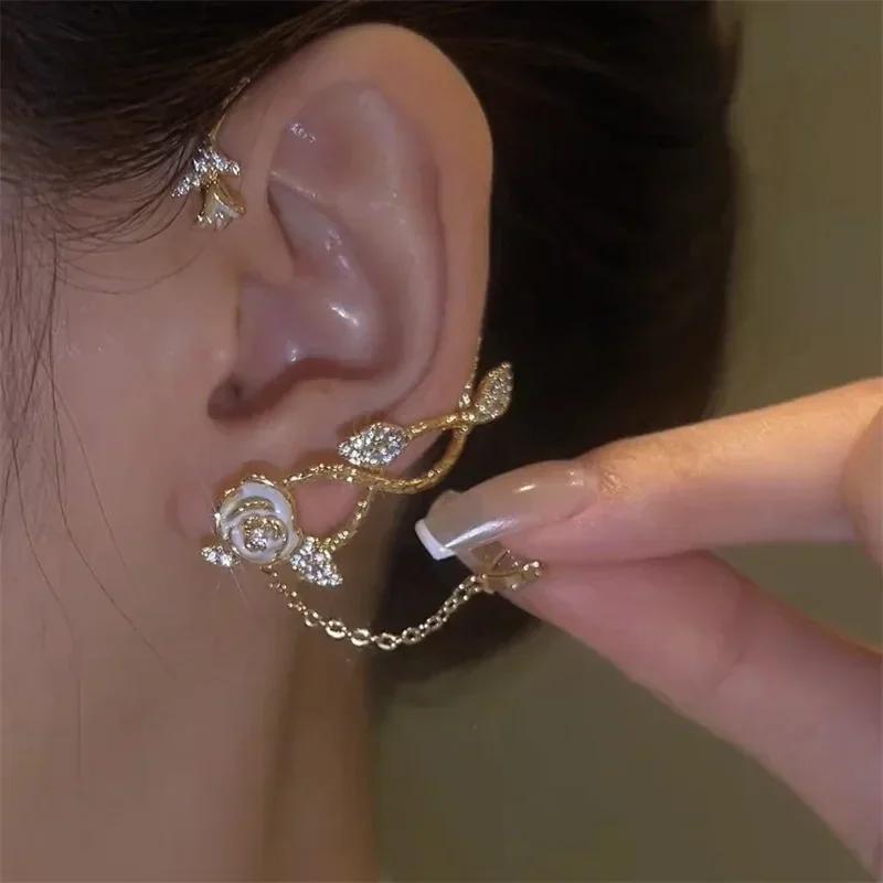 Изысканные серьги-клипсы в форме розы из легкой роскоши с хрустальными звездами и длинными кисточками