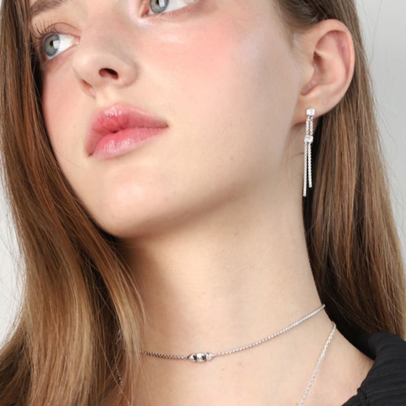 Серьги-капли триллион из серебристого муассанита