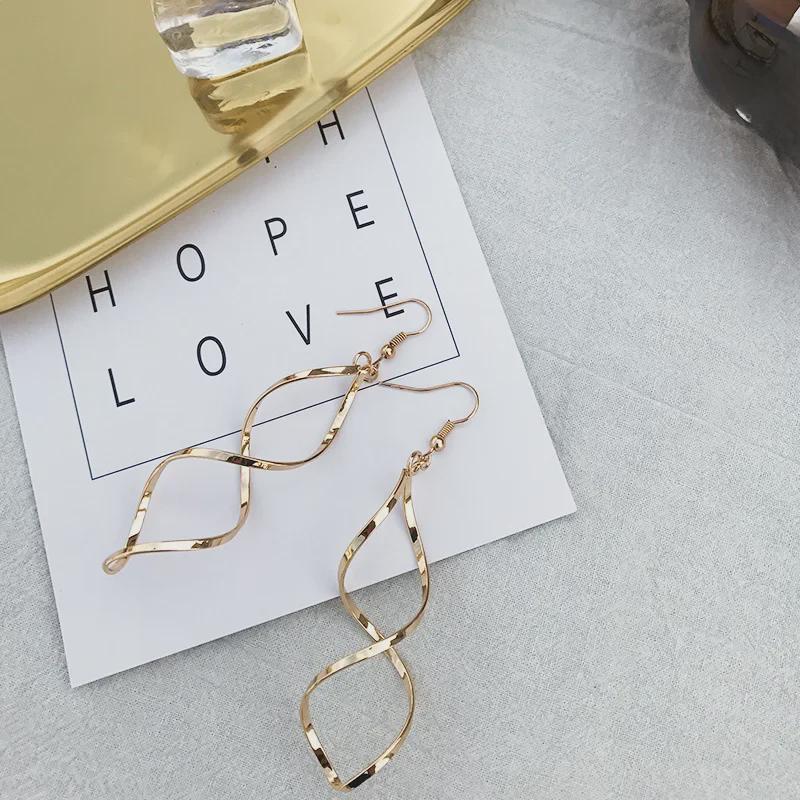 Современные геометрические серьги-капли в виде спиральной волны - Модные металлические украшения для женщин