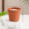 Mini Potted Plant: Handmade White Anti-Fall Ceramic-Style Flower Pot with Crochet Design and Artificial Lawn.