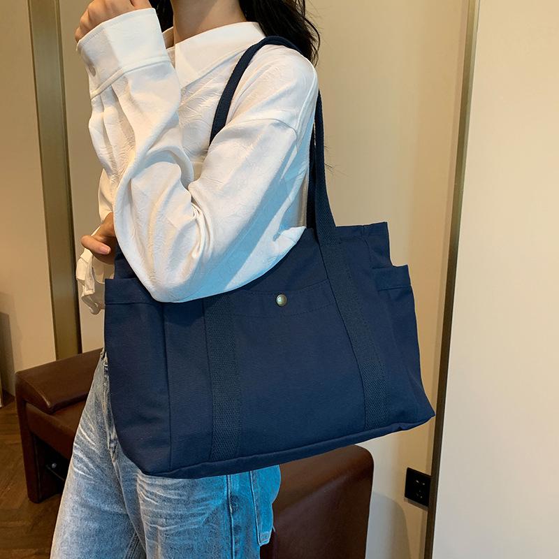 Женская холщовая сумка-тоут: Универсальная вместительная сумка с множеством карманов для студентов и пассажиров