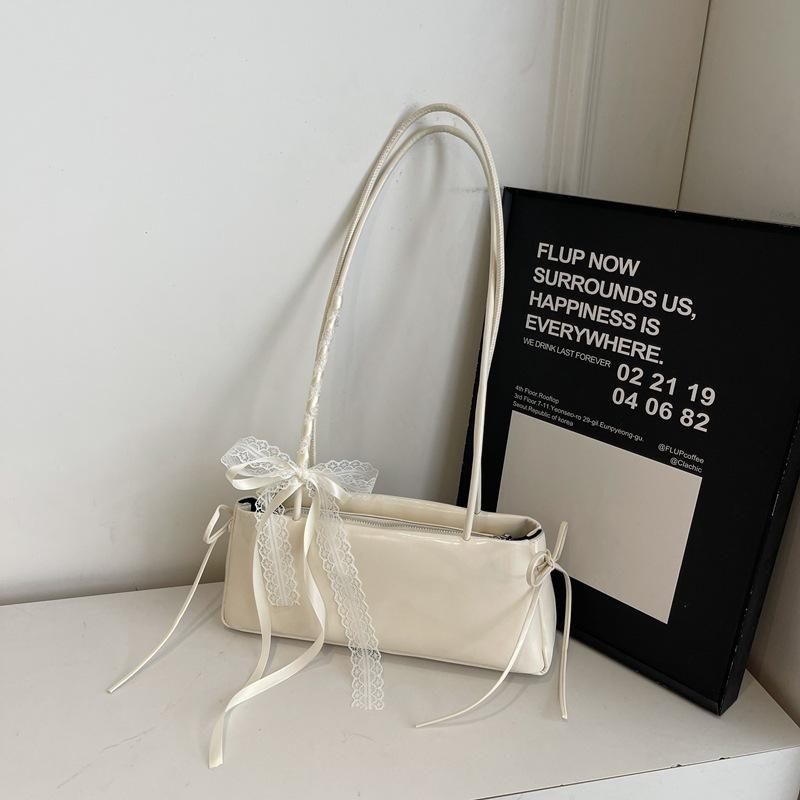 Сумка нишевого дизайна, сумка под мышкой, женская, 2025 новая, на плечо, для поездок на работу, модная, универсальная женская сумочка