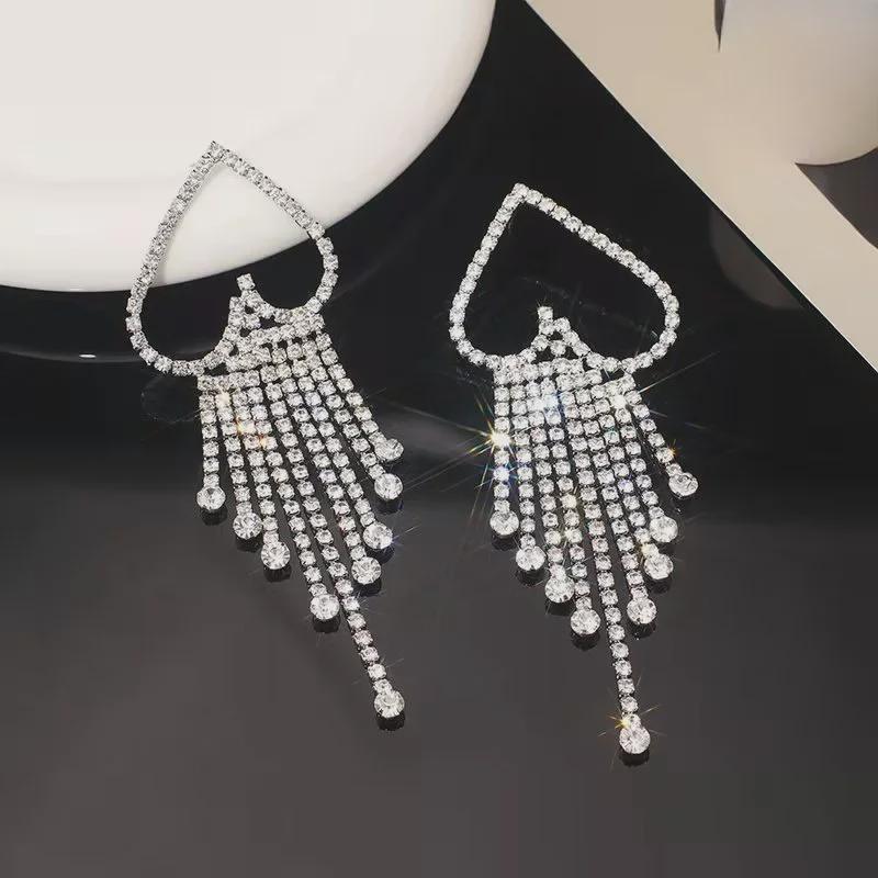 Серьги-подвески в форме сердца из серебра 925 пробы — модные, универсальные и в корейском стиле с акцентами из стразов