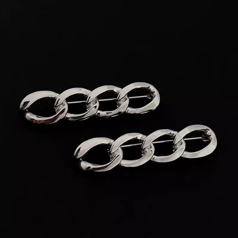 Женская блестящая брошь-цепочка: Эластичный аксессуар, подчеркивающий талию, и булавка от нескромности