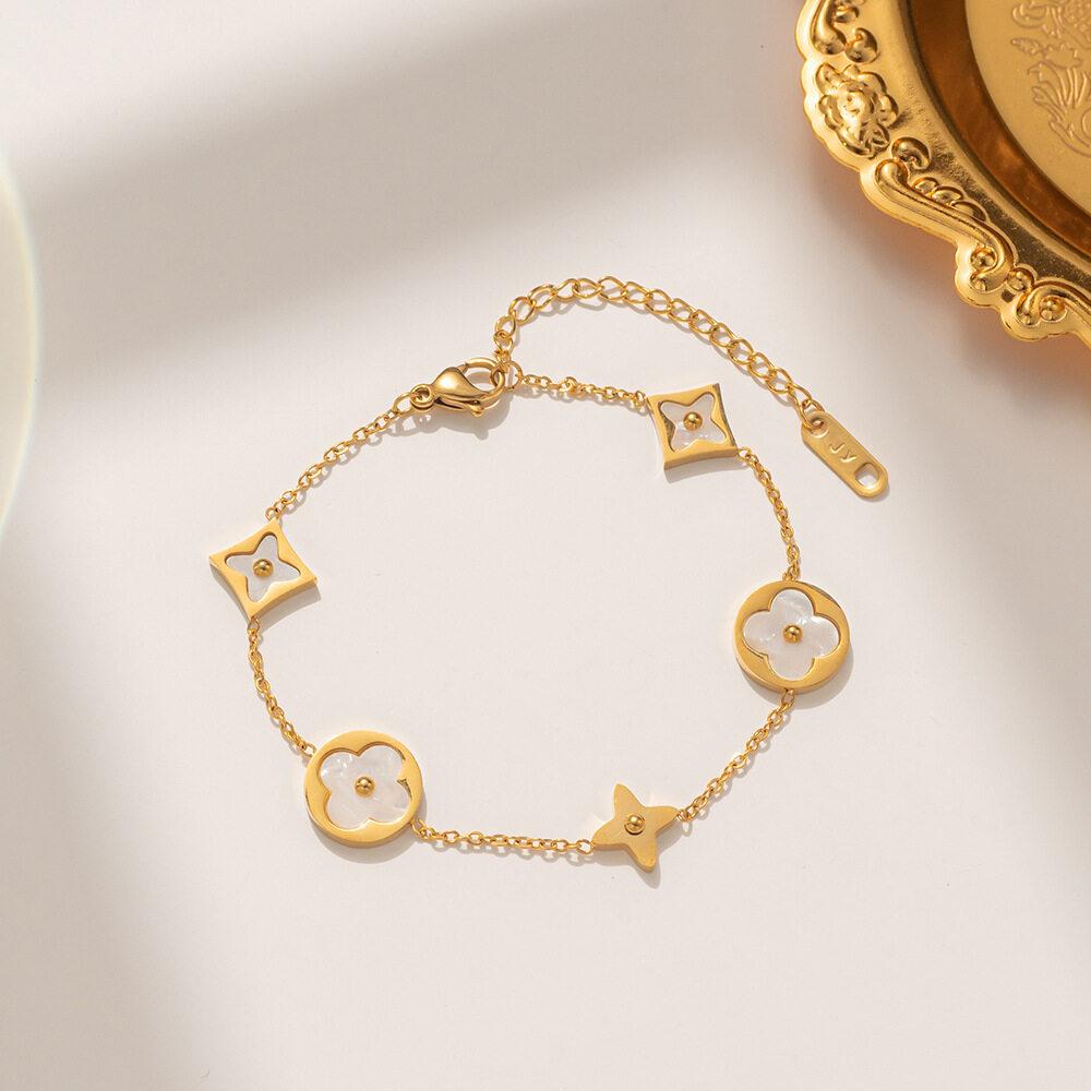 Темпераментный двусторонний браслет из нержавеющей стали, черный/цвет ракушки, четырехлистный клевер, элегантный браслет из розового золота