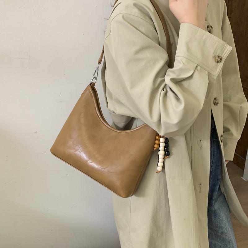 Маленькая сумка высокого класса женская 2025 новая осенне-зимняя модная универсальная сумка-мессенджер ретро на плечо подмышку сумка-ведро