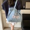 Модная и повседневная сумка-тоут большой вместимости женская 2025 новая сумка-мессенджер для通勤, корейская версия холщовой женской сумки с алфавитом