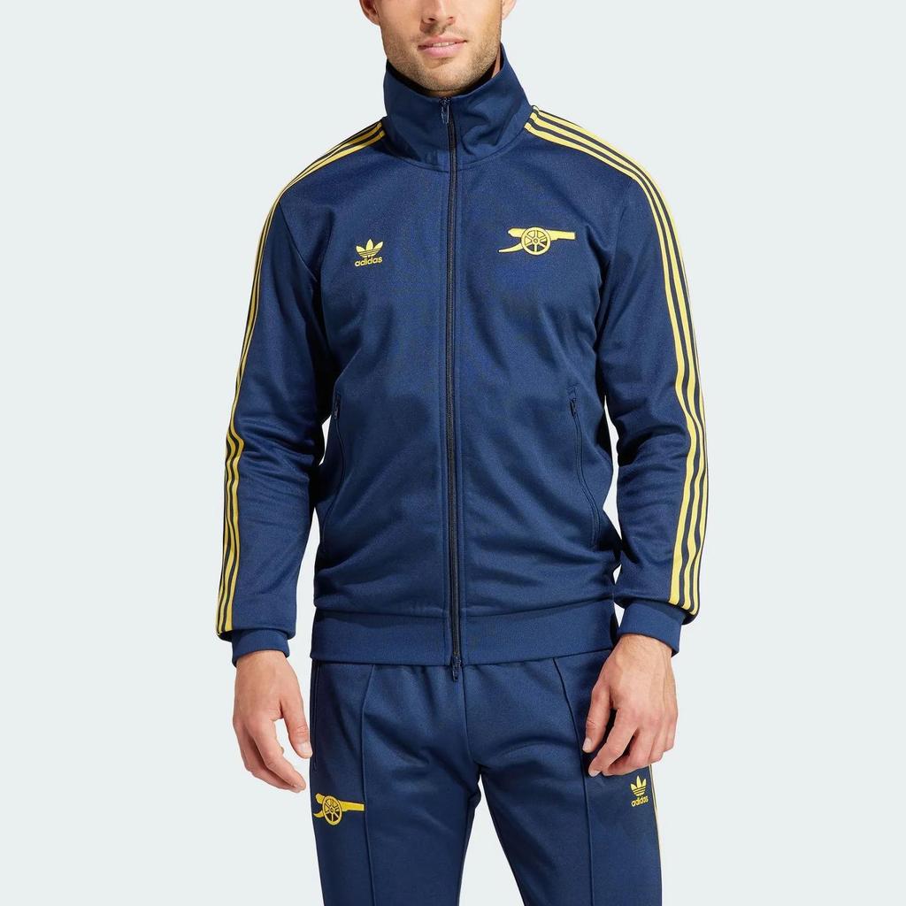 adidas Originals АРСЕНАЛ БЕККЕНБАУЭР ТРЕК-ТОП Куртки Пальто Мужские Цвет: Колледж-синий / Трибальный желтый (унисекс) Куртки IK8711