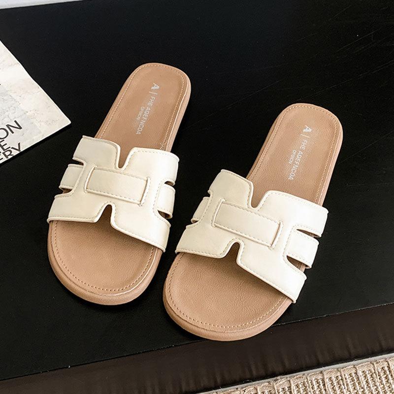 Французские однословные тапочки для женской уличной одежды 2025 новый летний приморский пляж красивые на плоской подошве уличные на плоской подошве прохладные тапочки