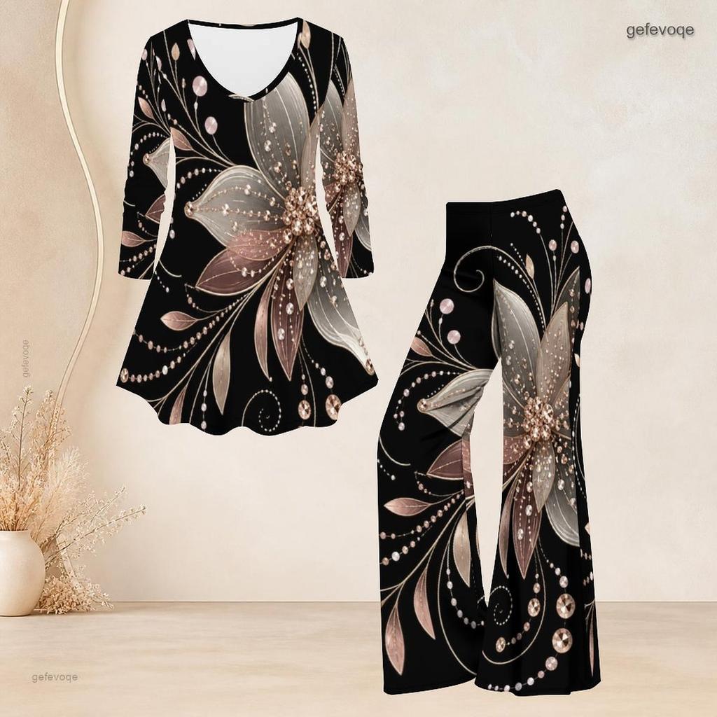 Women Plus Size Black Printed V Neck Three Quarter Sleeve Flared Top And Flared Pants Two Piece Set