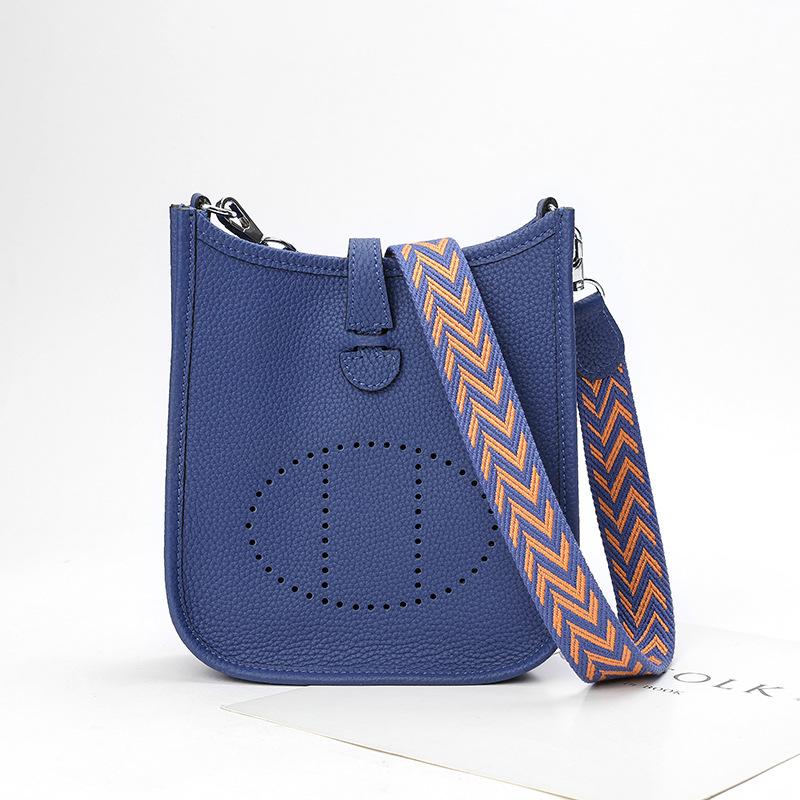 Фабричная оптовая продажа сумка-ведро из натуральной коровьей кожи первого слоя женская сумка с узором личи полый дизайн на одно плечо через плечо полый дизайн