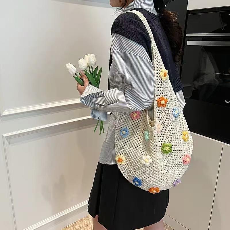 Idyllic lazy knitted flower new tote commuter large capacity seaside shoulder armpit woven bag