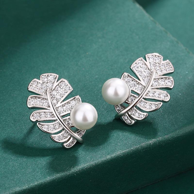 Jewelry imitation pearl pendant S111 silver needle feather pearl stud earrings European and American luxury zircon ring jewelry women's