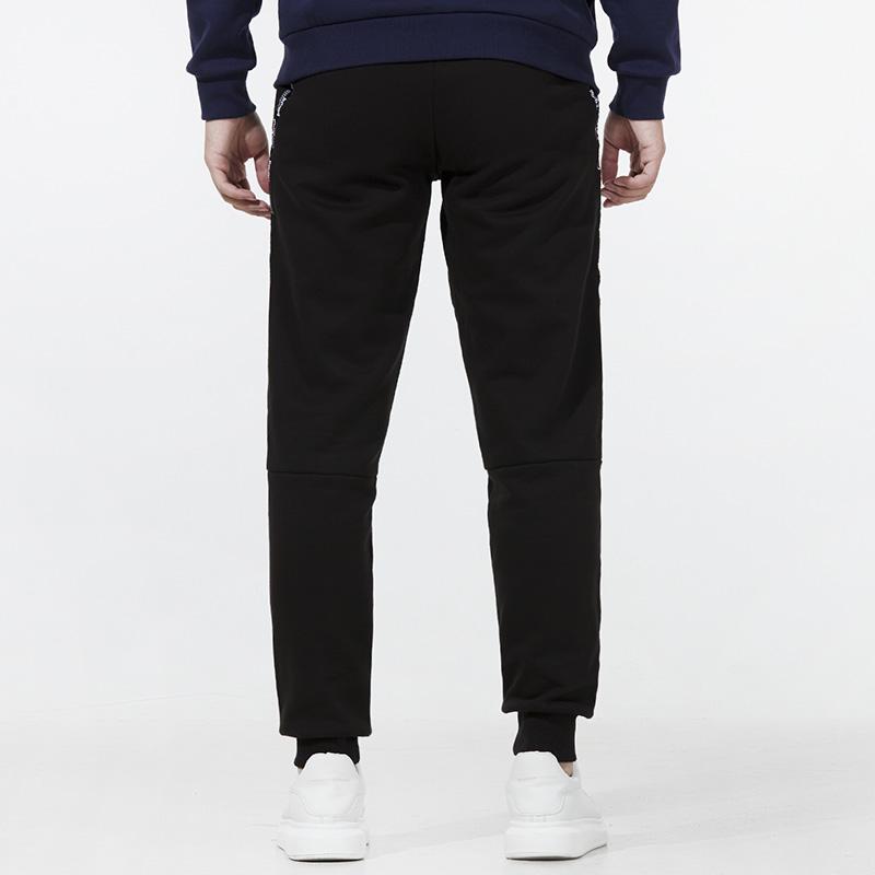 Puma Спортивные штаны Power Tape с манжетами на щиколотках и тканым логотипом Мужские брюки черные 846543-01