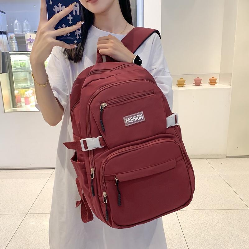 IELGY Korean Version of the Casual Large-capacity Backpack Female Simple Primary School Junior High School Student Bag