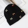 Wool hat Women's autumn and winter cherry knitted hat Curled edge thickened warm pullover hat Cold hat shows small face