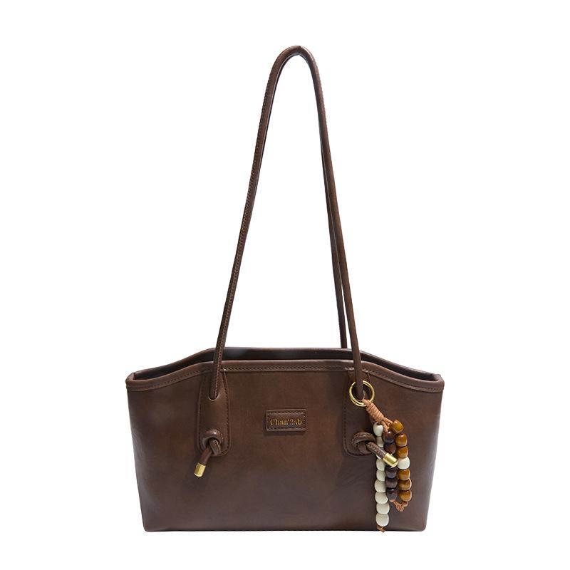 Женская сумка через плечо большой вместимости 2025 новая трендовая осенне-зимняя ретро мода сумка-тоут для通勤 ручная сумка