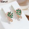 Серьги-подвески Kinel с блестящим зеленым цирконом и паве