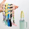 Handmade Macrame Daisy Drink Carrier with Adjustable Hand Strap Coffee Cup Sleeve Reusable Caddy for Boba Tumbler