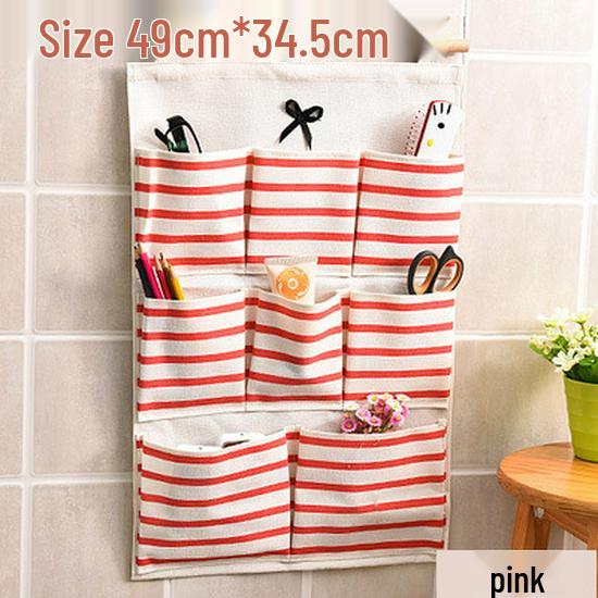 Полосатая настенная подвесная сумка для хранения из хлопка и льна с бантом и множеством карманов для кухни или ванной комнаты.