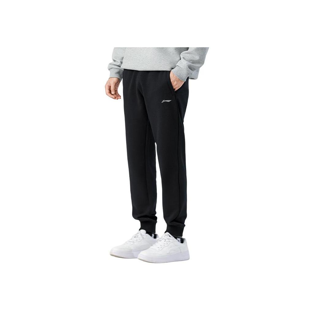 Li Ning Sports Lifestyle Series однотонные свободные брюки с манжетами, влагоотводящие, дышащие, повседневные брюки для мужчин, черные AKLTE51-1