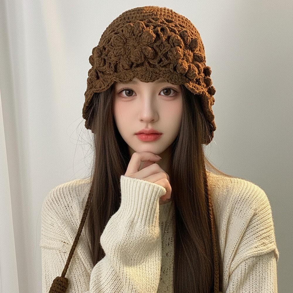 Hand-crocheted flower fringed wool hat women's autumn and winter western Sichuan travel versatile fashion show face small knitted headgear
