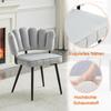 Round 60 cm MDF table with black support foot, with 2 light gray dining chairs with velvet-covered petal-shaped backrest and black metal legs.
