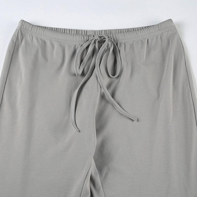 Повседневный комплект расклешенных брюк для женщин, однотонный укороченный топ-майка, брюки на низкой посадке со шнуровкой, костюм-двойка, одежда для дома, уличная одежда