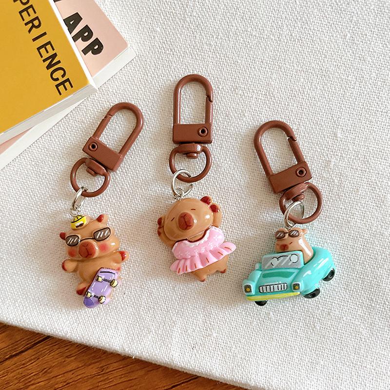 1 шт. мультяшный капибала брелок креативный капибара телефон кулон наушники чехол подвески сумка декор автомобильный брелок аксессуары