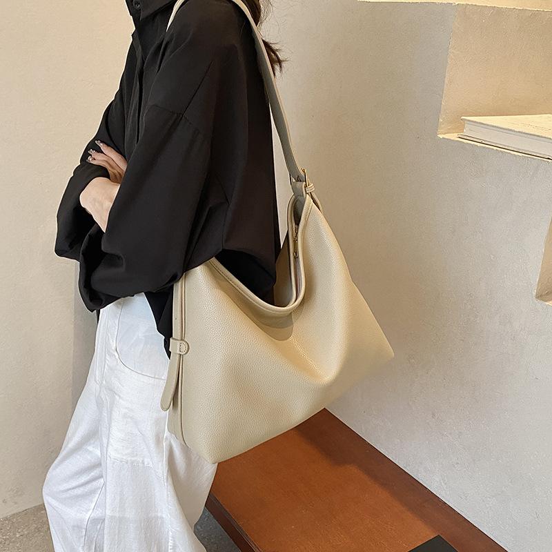 Премиальная сумка для поездок на работу женская 2024 новая повседневная универсальная сумка через плечо подмышкой простая темпераментная сумка-ведро