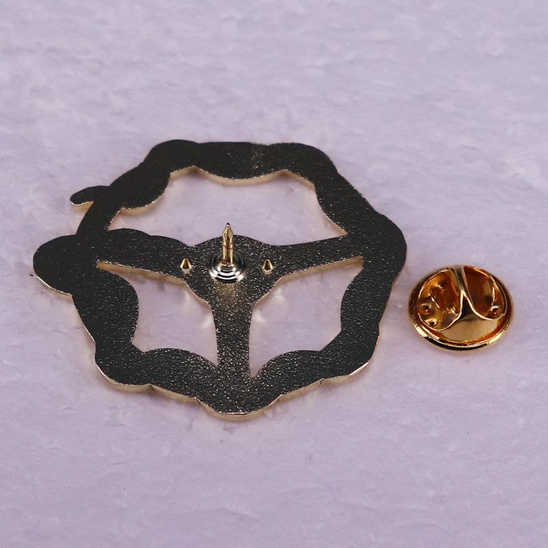 Gold Steering Wheel Brooch & Snake Ring Badge