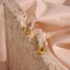 European & American Pearl Brooch Ear Cuff: Trendy Stainless Steel Earrings for Women