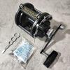 Б/у катушка PENN 40 GLS Графитовая с двойной осью и рычагом фрикциона