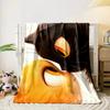 A black and an orange cat touching noses with expressive, glowing eyes. for all seasons blanket lunch break throw gift
