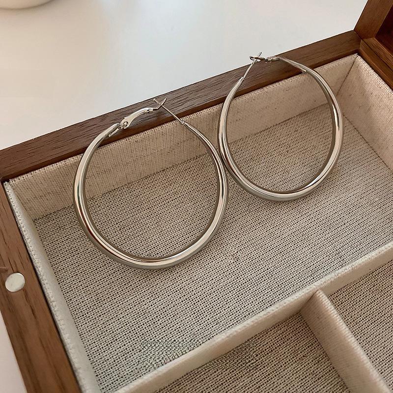 Silver Needle Style Circle Earrings - Simple Korean Metal Design, All-Match Earrings for a Celebrity Look.