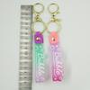 PVC Keychain with Leather Cord and Candy Soft Rubber Doll, Transparent Lanyard, and Jelly Gradient Color Hand Rope
