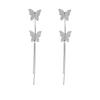 Light luxury flash zirconium butterfly fringed earrings, fashion temperament, niche earrings, high-end mosquito coil disc ear clips, no ear piercings.