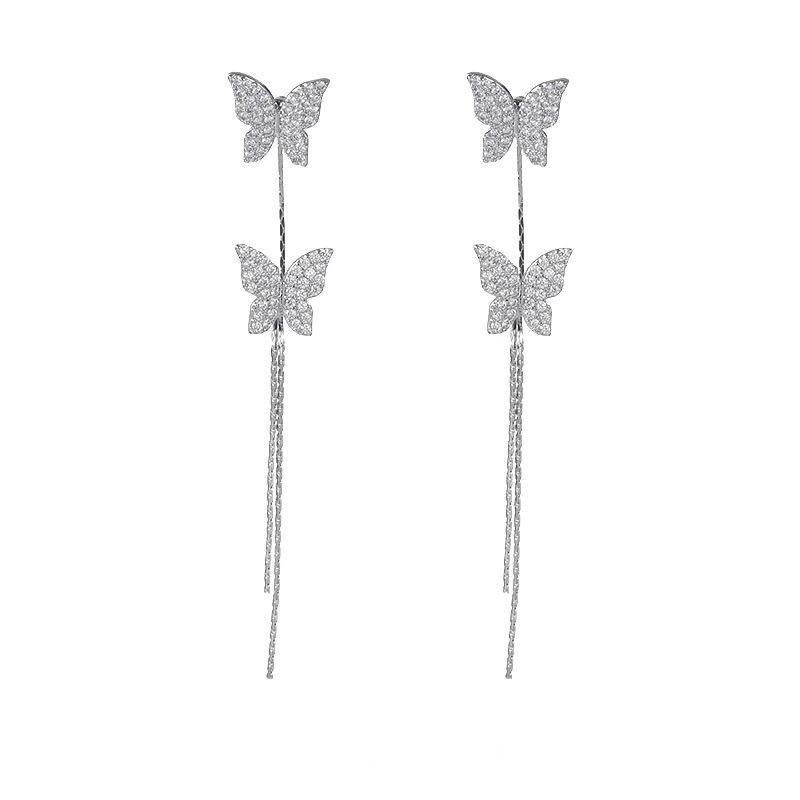 Light luxury flash zirconium butterfly fringed earrings, fashion temperament, niche earrings, high-end mosquito coil disc ear clips, no ear piercings.