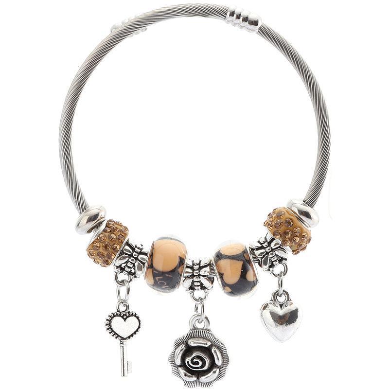 Стильный женский браслет из нержавеющей стали с шармами