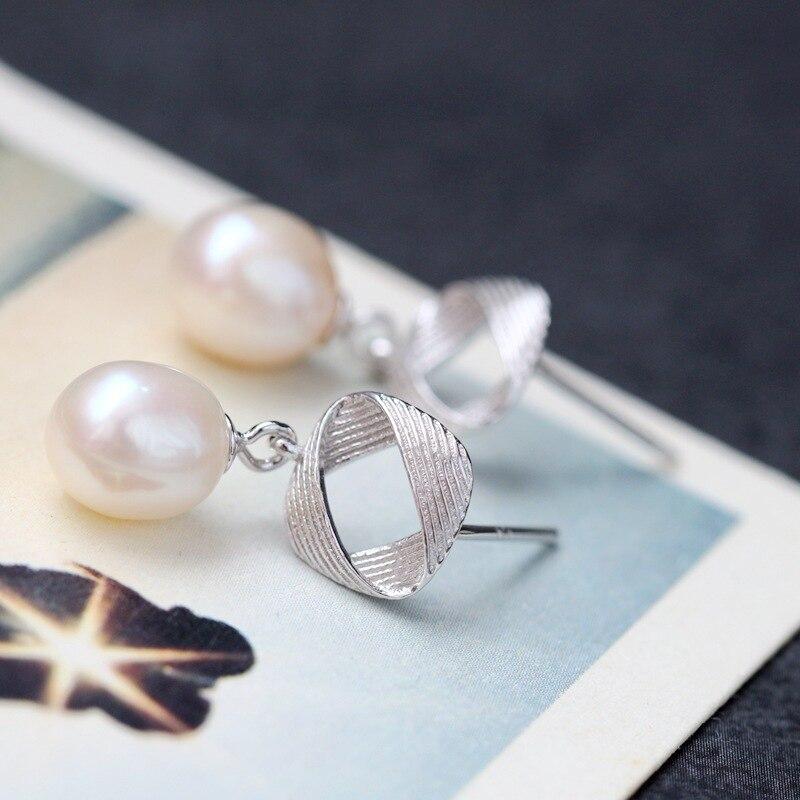 Серьги из серебра 925 пробы ручной работы с натуральным жемчугом.