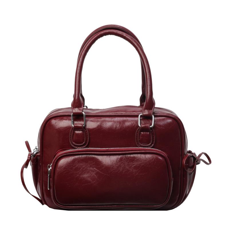 Рюкзак Женский рюкзак 2025 Новый Большая вместимость Нишевый Простой Городской Колледж Колледжный стиль Кожаная школьная сумка