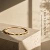 Full polished surface, equidistant cross grooves, individually set single zirconia, gold-tone thin bracelet for women Minimalist Commuting Light