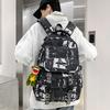 Junior high school college student schoolbag female graffiti backpack large capacity trendy cool boys fashion high value travel backpack